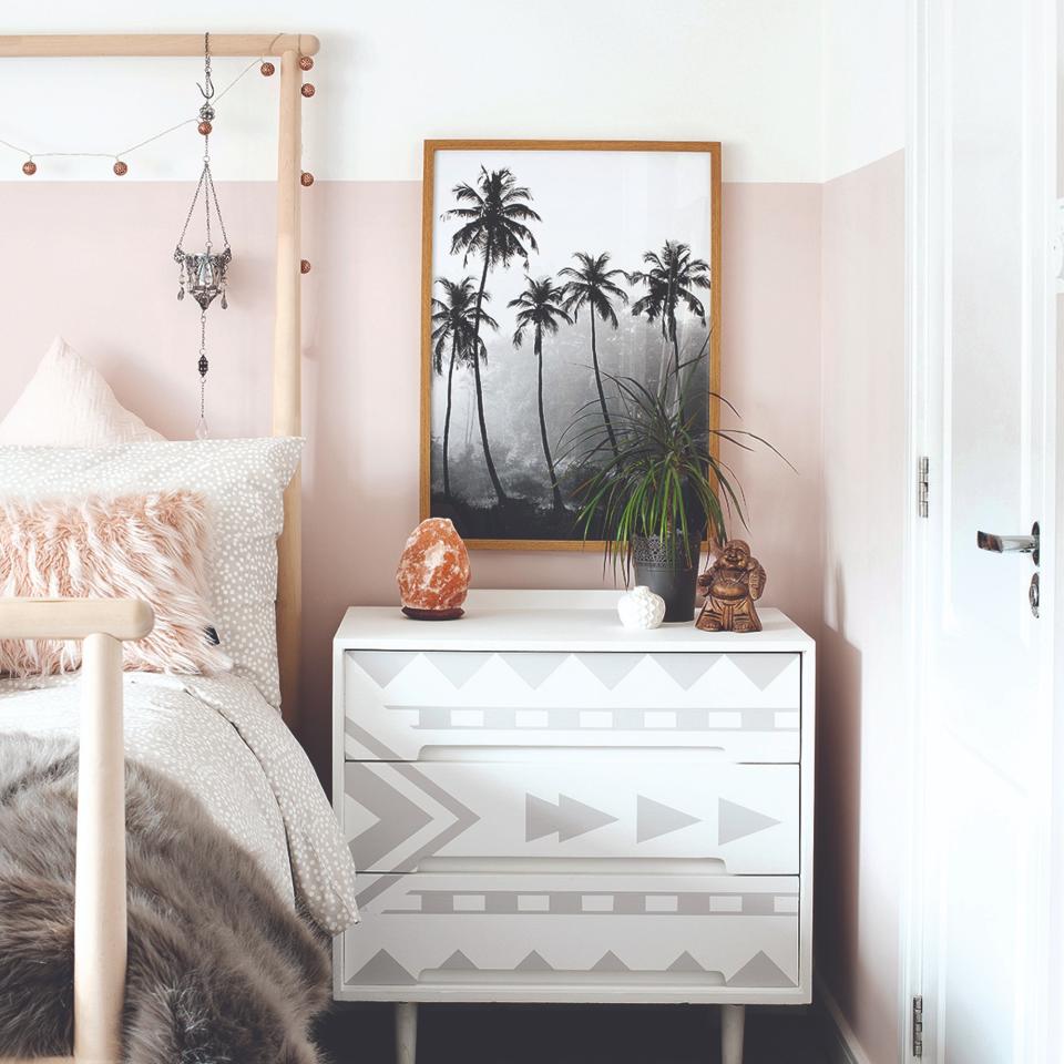  Bohemian bedroom with a buddha statue and salt lamp 