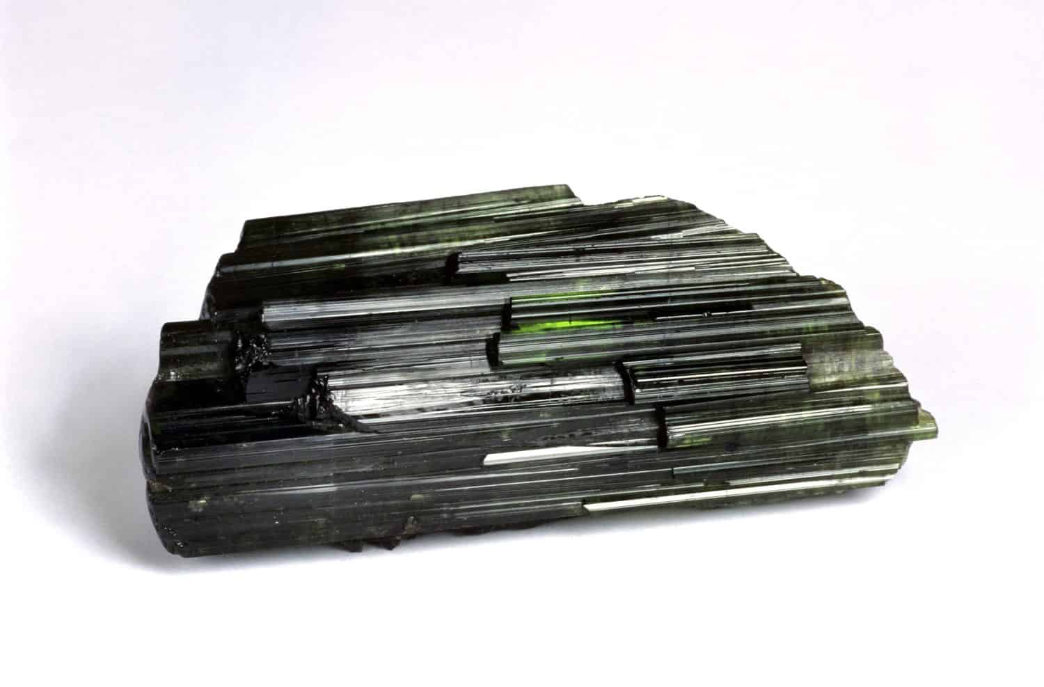 Green Tourmaline Stone against White Background  